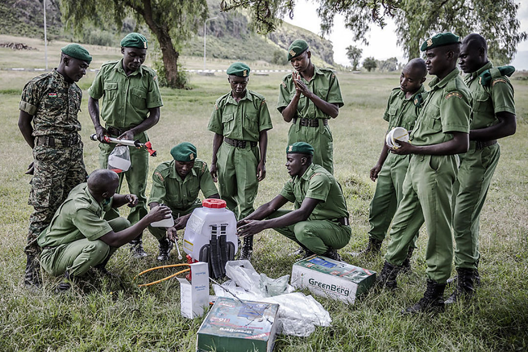 National Youth Service officers inspect some spraying tools during a training on desert locust control at Kenya's National Youth Service Training College in Gilgil, Kenya. Photo: FAO/Luis Tato