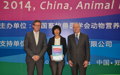 Dr. Marcel Wubbolts and Dr. Gilbert Weber presenting the Science & Technology Award Asia, China Nutrition 2014.