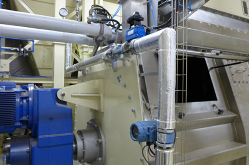 Photo: Adisseo<br />In the feed mill, liquid methionine (D,L-HMTBA) is stored then dosed and transferred to the mixer where it is sprayed.