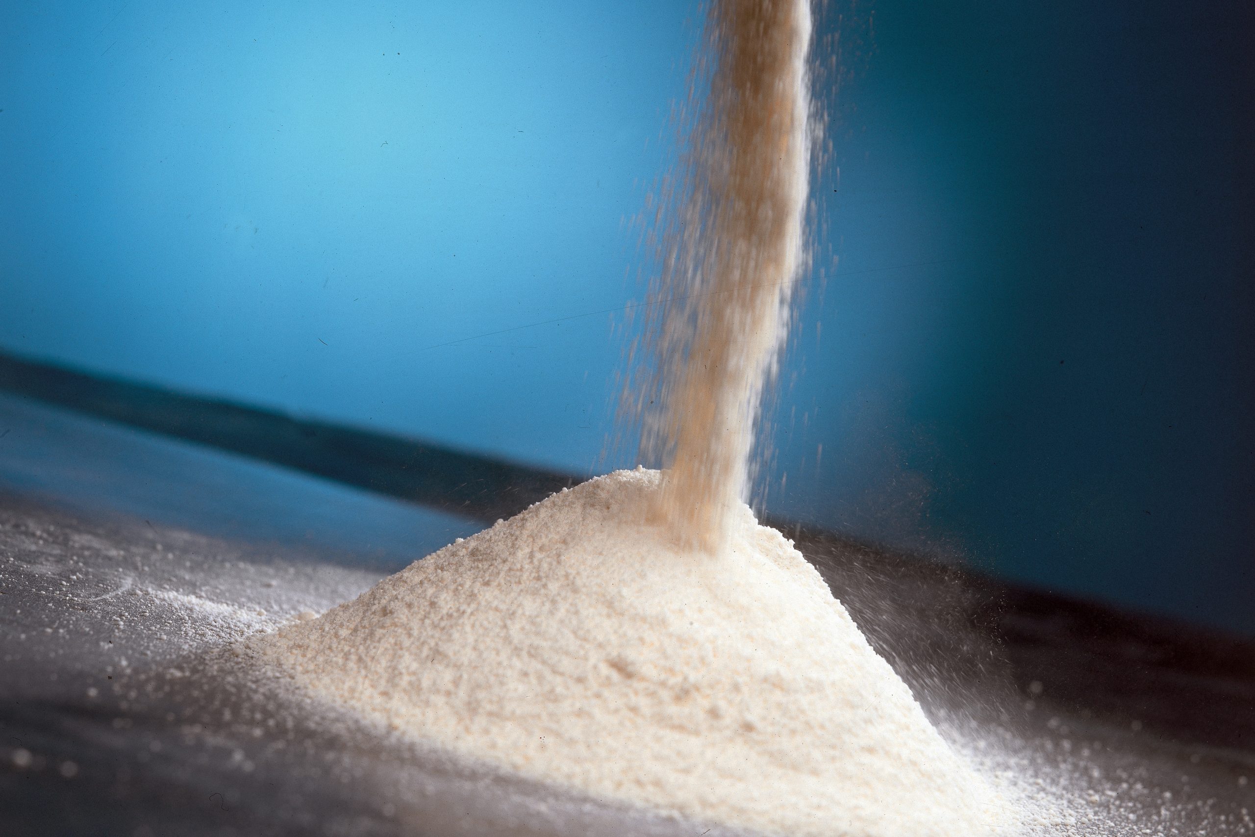 Feed additives can be added during processing as dry or liquid form. Liquid addition always causes micro-agglomeration or clustering by binding small sized particles to larger particles. Photo: RBI